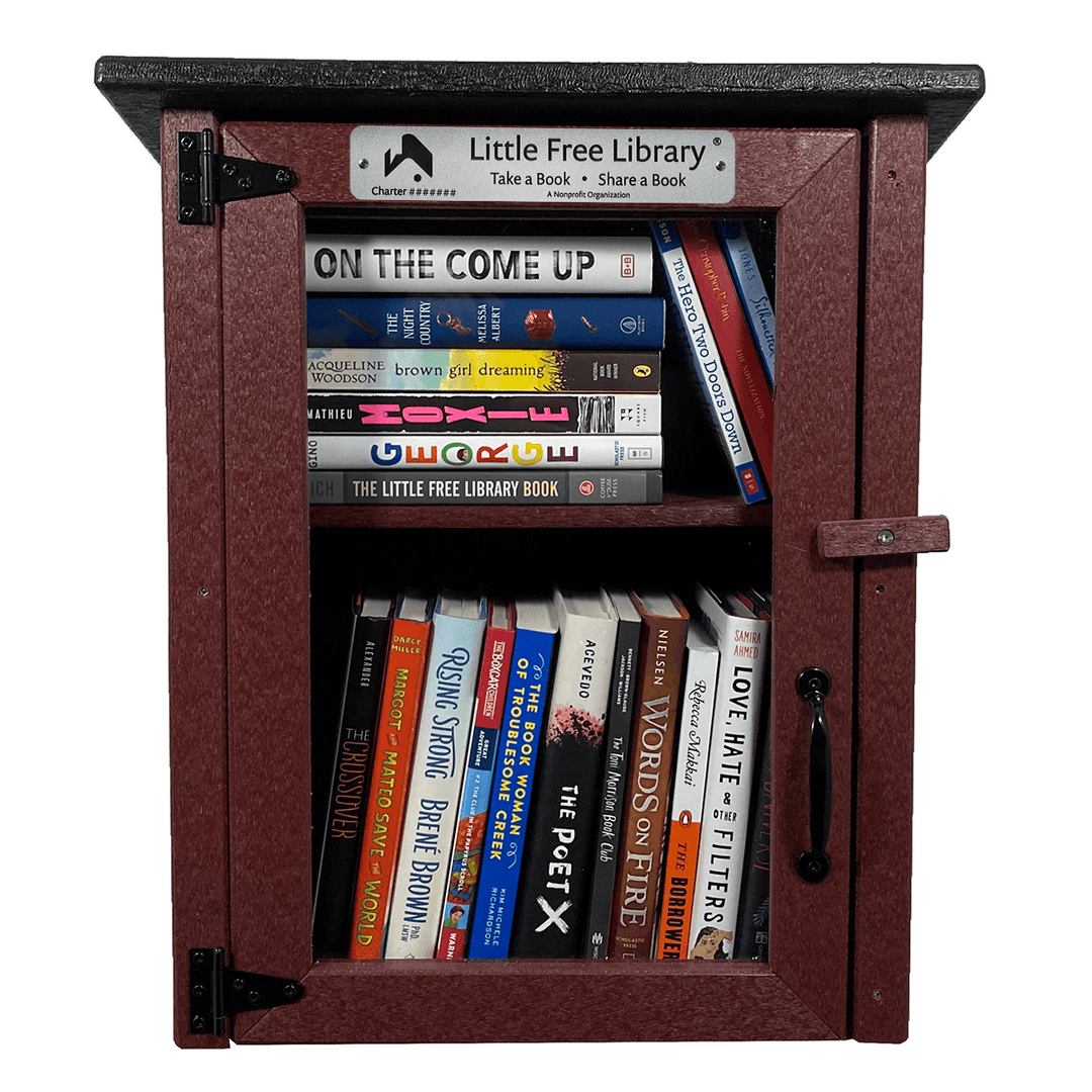 Facade View of a Composite Two Story Maroon Little Free Library with Books and Shelf